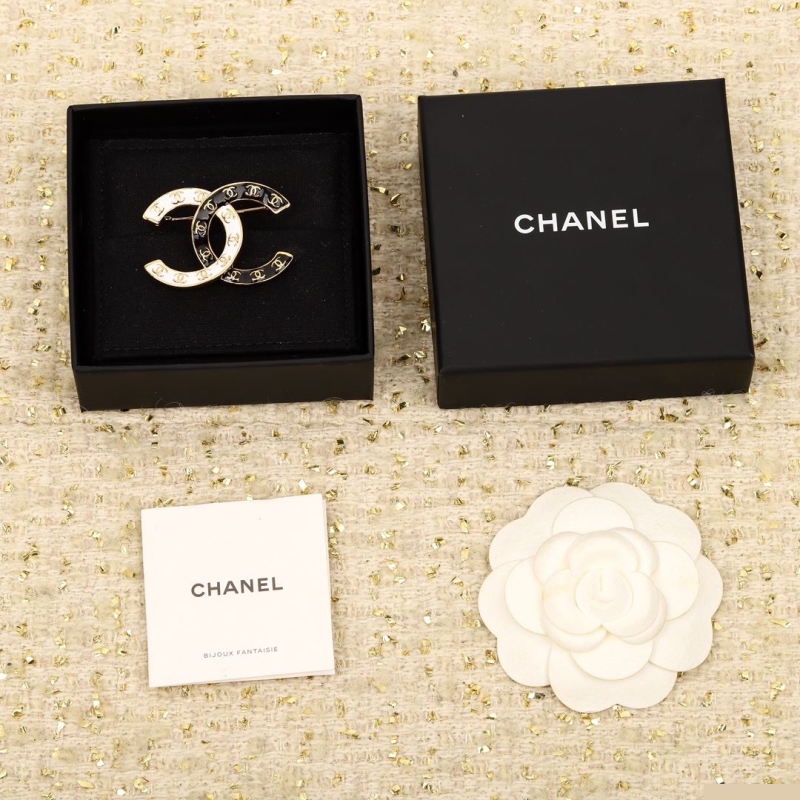 Ch*el brooches